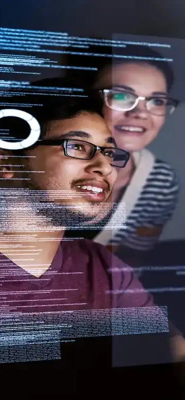 three colleagues looking ambitiously at a screen of information